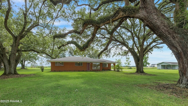 17639 Pelican Rd, Erath, LA 70533 - view of front of house with a front lawn