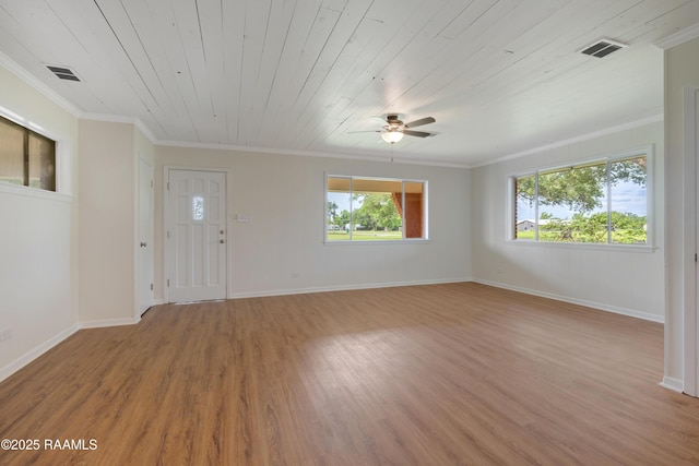 17639 Pelican Rd, Erath, LA 70533 - spare room featuring light wood-style flooring, ceiling fan, baseboards, crown molding, and wooden ceiling