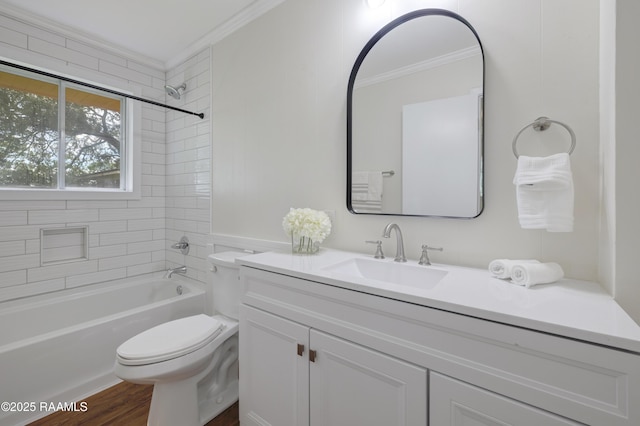 17639 Pelican Rd, Erath, LA 70533 - bathroom featuring ornamental molding, vanity, toilet, wood finished floors, and  shower combination