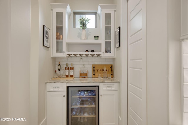 137 Grandview Terrace Dr, Youngsville, LA 70592 - indoor dry bar featuring wine cooler and backsplash