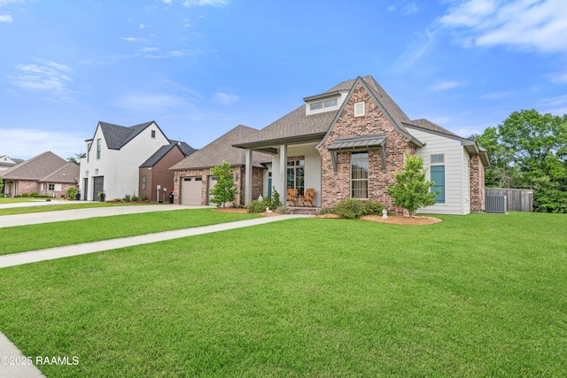 137 Grandview Terrace Dr, Youngsville, LA 70592 - view of front of house featuring brick siding, concrete driveway, an attached garage, central air condition unit, and a porch
