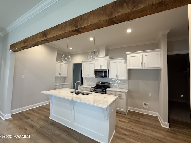 303 Bennington Ln, Youngsville, LA 70592 - kitchen with stainless steel appliances, a sink, backsplash, ornamental molding, and white cabinets