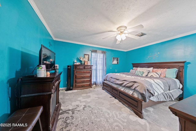 bedroom featuring carpet flooring, crown molding, a textured ceiling, and ceiling fan