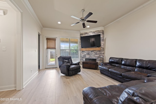 113 Gilmore Rd, Youngsville, LA 70592 - living area with wood finished floors, crown molding, a ceiling fan, baseboards, and recessed lighting