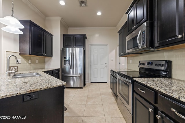 113 Gilmore Rd, Youngsville, LA 70592 - kitchen with appliances with stainless steel finishes, a sink, light stone counters, tasteful backsplash, and crown molding