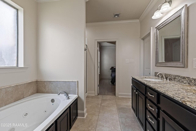 113 Gilmore Rd, Youngsville, LA 70592 - full bathroom with ornamental molding, vanity, a tub with jets, tile patterned flooring, and baseboards