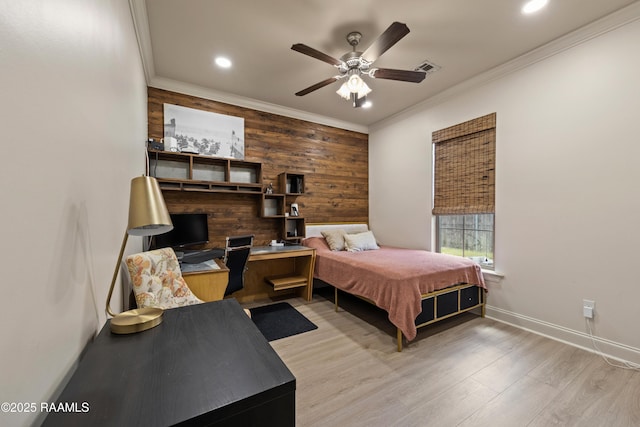 113 Gilmore Rd, Youngsville, LA 70592 - bedroom with light wood-style floors, recessed lighting, wood walls, a desk, and crown molding