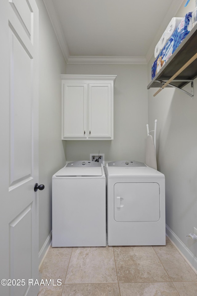 107 Harbor Walk Dr, Lafayette, LA 70508 - laundry room featuring washing machine and clothes dryer, crown molding, cabinet space, baseboards, and light tile patterned floors