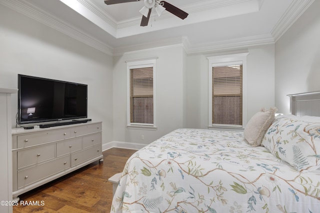 107 Harbor Walk Dr, Lafayette, LA 70508 - bedroom featuring a raised ceiling, dark wood-type flooring, ornamental molding, baseboards, and ceiling fan