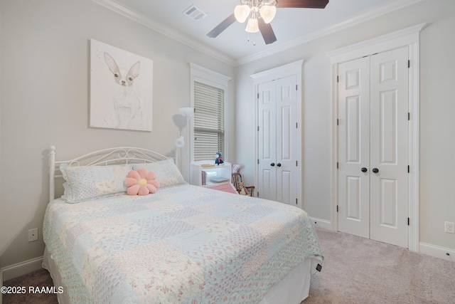 107 Harbor Walk Dr, Lafayette, LA 70508 - bedroom featuring carpet flooring, two closets, baseboards, crown molding, and a ceiling fan