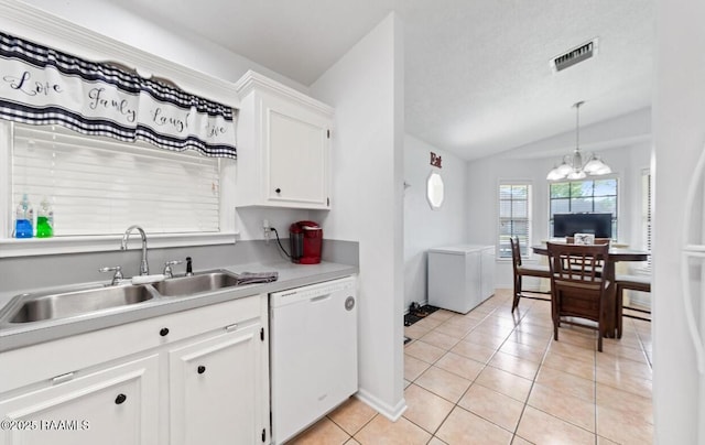 211 Dartmoor Dr, Lafayette, LA 70506 - kitchen featuring white dishwasher, a sink, lofted ceiling, white cabinets, and light tile patterned floors