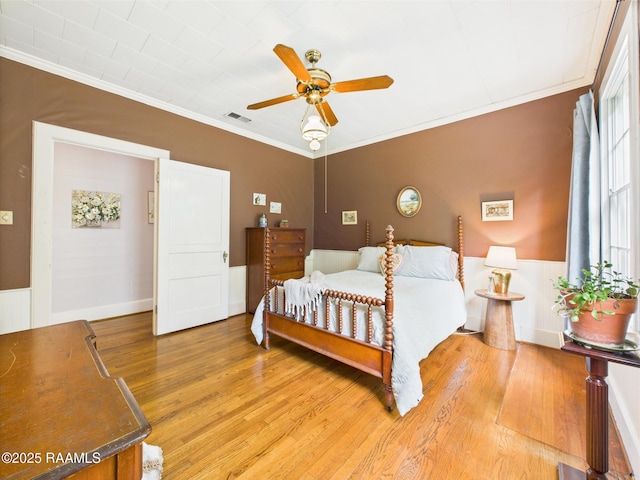 1635 Myrtle Pl, Lafayette, LA 70506 - bedroom featuring ornamental molding, light wood finished floors, and ceiling fan