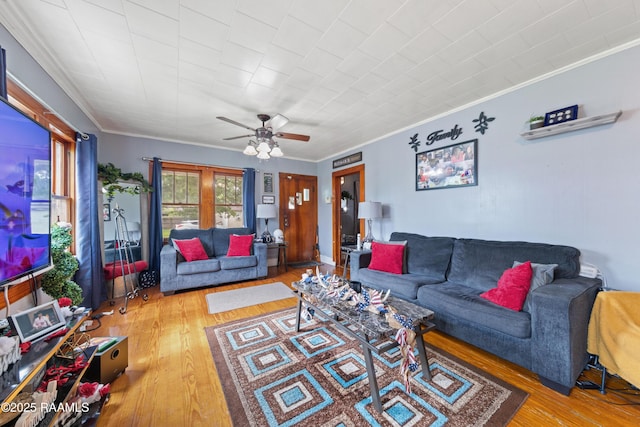 408 Loraine St, Abbeville, LA 70510 - living area featuring wood finished floors, a ceiling fan, and ornamental molding