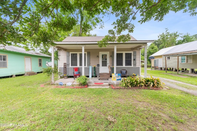 408 Loraine St, Abbeville, LA 70510 - view of front of property featuring entry steps and a front lawn