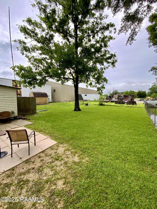 808 6th St, Rayne, LA 70578 - view of yard featuring a patio area