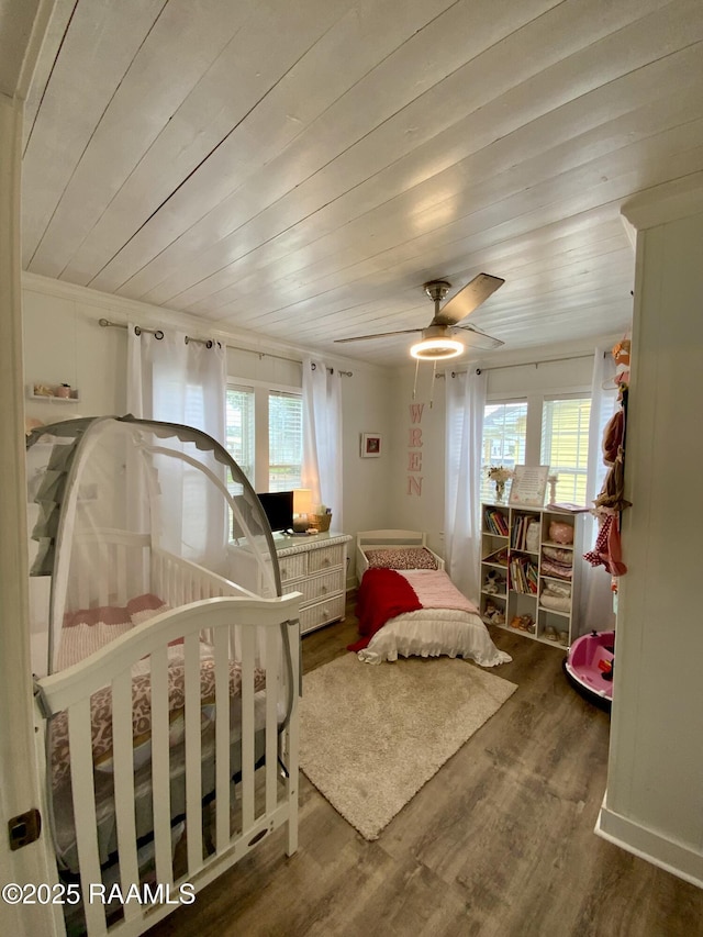 808 6th St, Rayne, LA 70578 - bedroom with wood finished floors, wooden ceiling, and ceiling fan