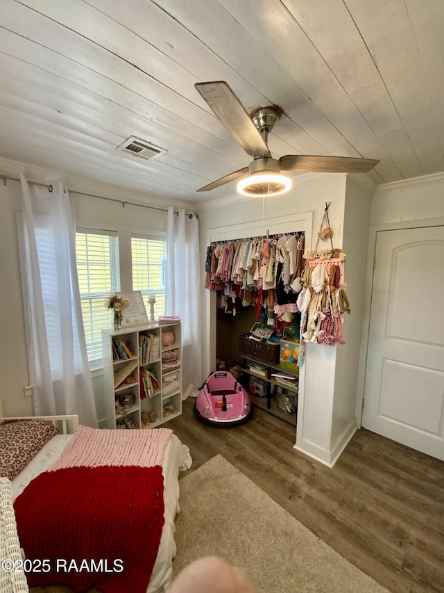808 6th St, Rayne, LA 70578 - bedroom with wood finished floors, wood ceiling, a closet, and ceiling fan
