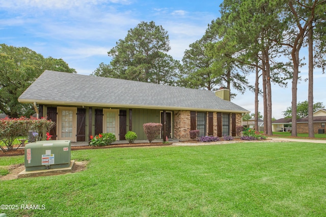 116 Twin Lakes Dr, Youngsville, LA 70592 - ranch-style house with a front lawn, a chimney, and roof with shingles