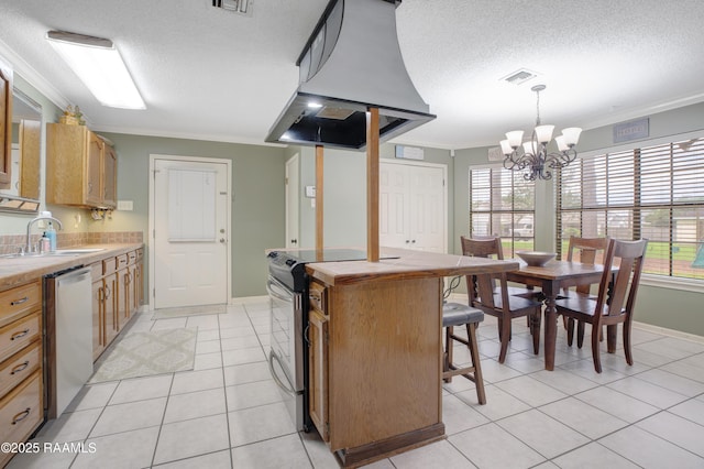 116 Twin Lakes Dr, Youngsville, LA 70592 - kitchen with island exhaust hood, a sink, stainless steel appliances, a textured ceiling, and crown molding