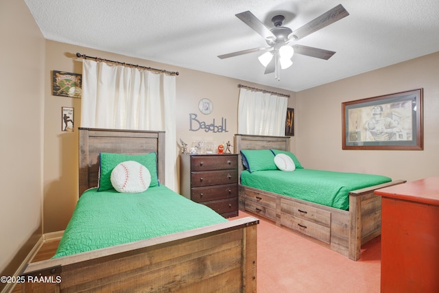 116 Twin Lakes Dr, Youngsville, LA 70592 - carpeted bedroom with a ceiling fan and a textured ceiling