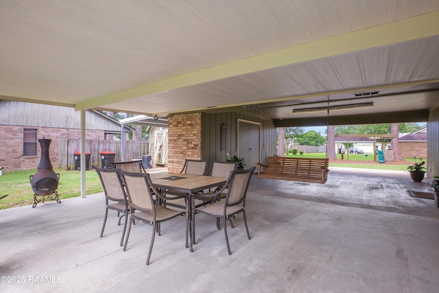 116 Twin Lakes Dr, Youngsville, LA 70592 - view of patio with fence and outdoor dining space