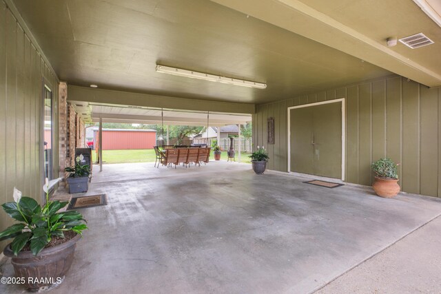 116 Twin Lakes Dr, Youngsville, LA 70592 - garage with fence and a storage unit