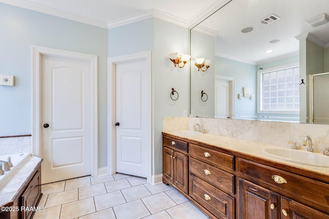 103 Barronne St, Lafayette, LA 70503 - full bath featuring double vanity, ornamental molding, a garden tub, tile patterned floors, and tasteful backsplash
