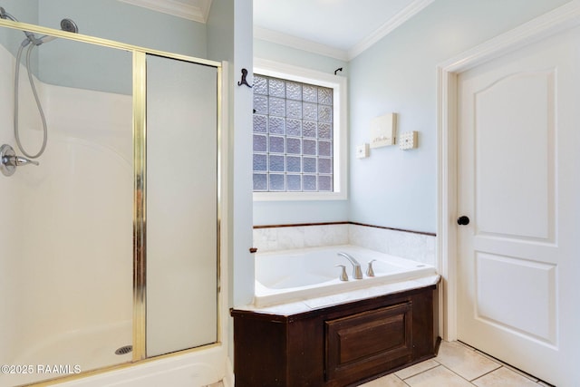 103 Barronne St, Lafayette, LA 70503 - bathroom featuring a shower stall, a garden tub, tile patterned floors, ornamental molding, and plenty of natural light