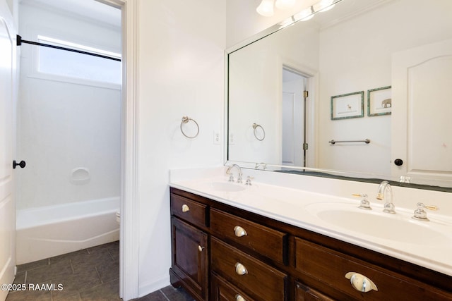 103 Barronne St, Lafayette, LA 70503 - full bath with double vanity, tile patterned flooring, and  shower combination