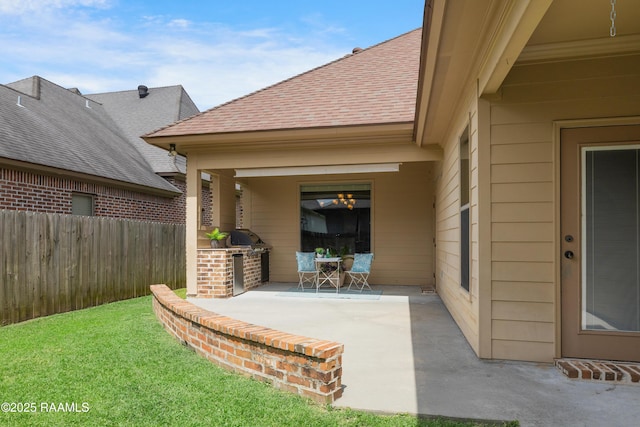 112 Heathwood Dr, Broussard, LA 70518 - view of patio / terrace featuring fence and an outdoor kitchen
