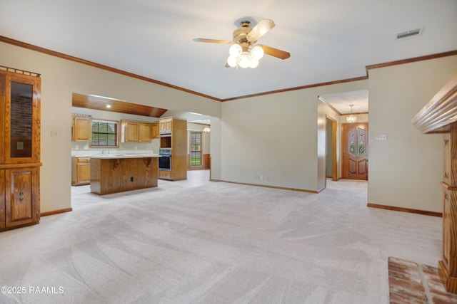 505 River Woods Dr, Lafayette, LA 70508 - unfurnished living room with light colored carpet, baseboards, ceiling fan, crown molding, and plenty of natural light