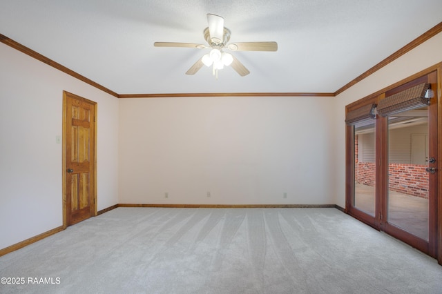505 River Woods Dr, Lafayette, LA 70508 - unfurnished room featuring light carpet, crown molding, baseboards, and ceiling fan