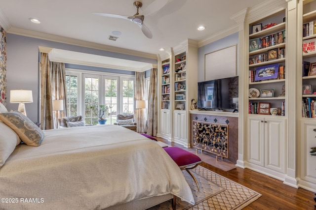 209 Princeton Woods Loop, Lafayette, LA 70508 - bedroom with ornamental molding, wood finished floors, recessed lighting, ceiling fan, and a fireplace