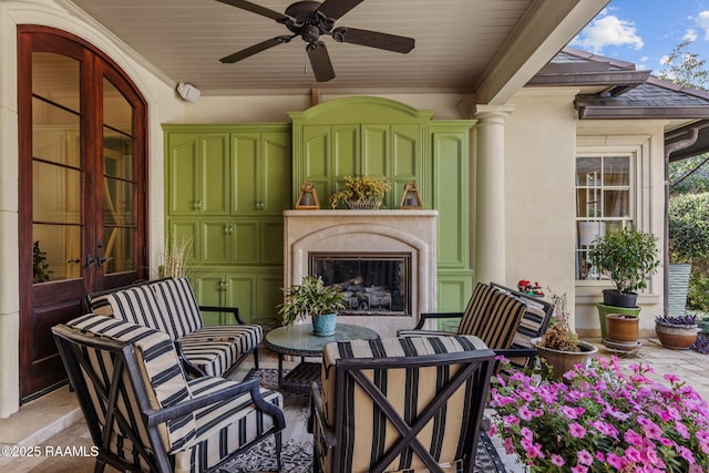 209 Princeton Woods Loop, Lafayette, LA 70508 - view of patio featuring ceiling fan, an outdoor living space with a fireplace, and french doors