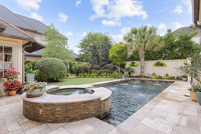 209 Princeton Woods Loop, Lafayette, LA 70508 - view of swimming pool with a fenced backyard, a pool with connected hot tub, and a patio