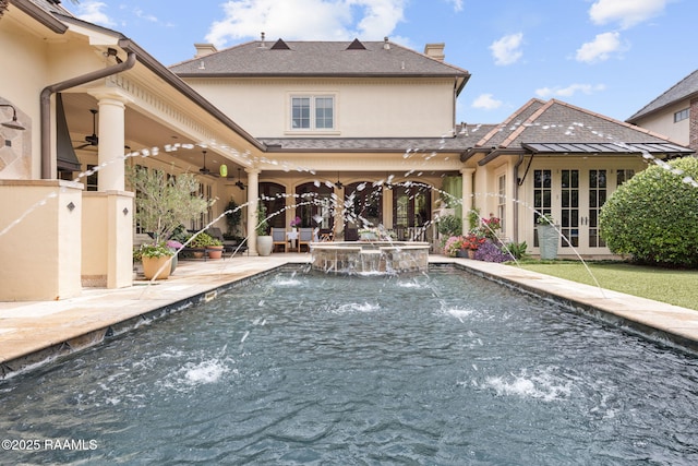 209 Princeton Woods Loop, Lafayette, LA 70508 - view of swimming pool featuring french doors, a ceiling fan, a pool with connected hot tub, and a patio area