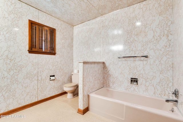 1341 College Rd, Eunice, LA 70535 - full bathroom with a bathtub, toilet, and baseboards