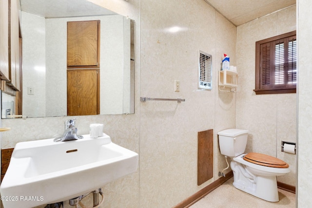 1341 College Rd, Eunice, LA 70535 - half bathroom with a sink and toilet