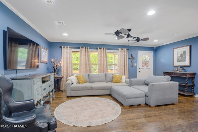 209 Irene Cir, Lafayette, LA 70503 - living area with crown molding, recessed lighting, wood finished floors, and ceiling fan