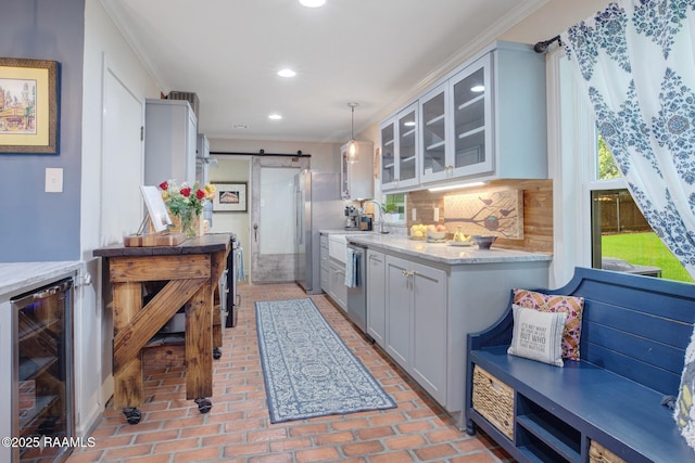 209 Irene Cir, Lafayette, LA 70503 - kitchen with wine cooler, a barn door, stainless steel dishwasher, glass insert cabinets, and tasteful backsplash