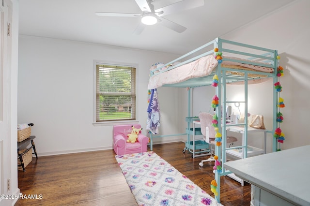 209 Irene Cir, Lafayette, LA 70503 - bedroom featuring wood finished floors, baseboards, and a ceiling fan