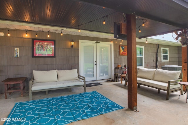 209 Irene Cir, Lafayette, LA 70503 - view of patio with outdoor lounge area, french doors, and cooling unit