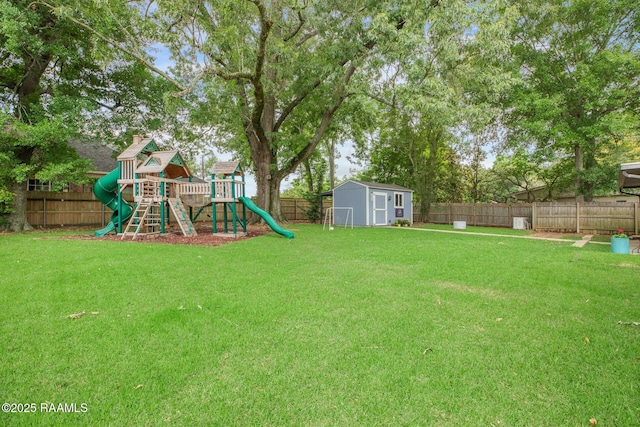 209 Irene Cir, Lafayette, LA 70503 - view of yard with a playground, a shed, and an outdoor structure