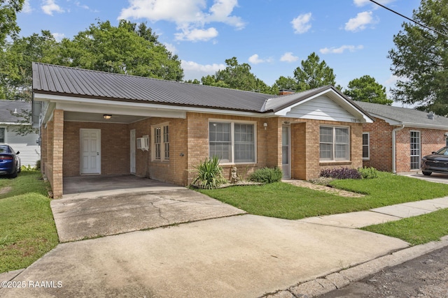 126 Vine St, New Iberia, LA 70560 - ranch-style house featuring brick siding, concrete driveway, a front yard, metal roof, and an attached carport