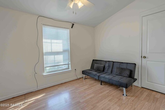 259 Chatrian St, Grand Coteau, LA 70541 - living area with light wood-style floors, a ceiling fan, and baseboards