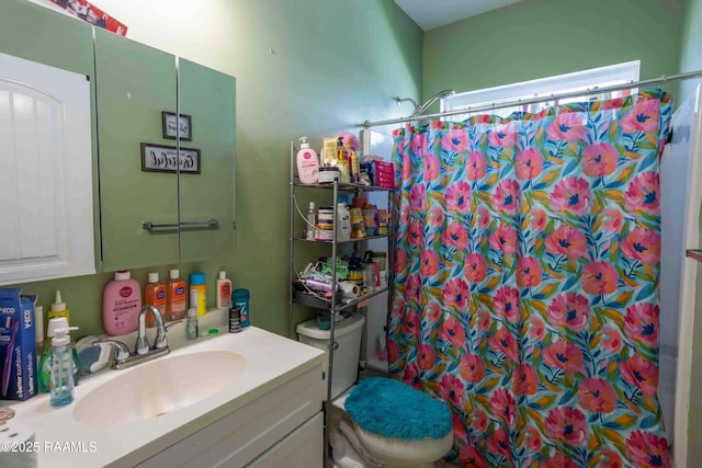 255 Chatrian St, Grand Coteau, LA 70541 - full bathroom with curtained shower, toilet, and vanity