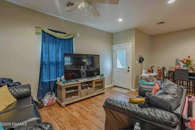 255 Chatrian St, Grand Coteau, LA 70541 - living area featuring ceiling fan, wood finished floors, recessed lighting, and baseboards
