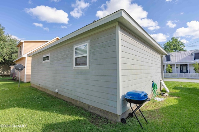 255 Chatrian St, Grand Coteau, LA 70541 - view of property exterior with a lawn
