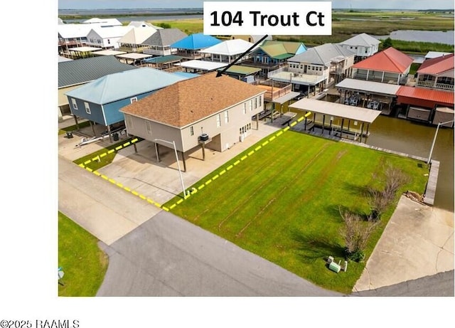 104 Trout Ct, Dulac, LA 70353 - aerial perspective of suburban area with a large body of water