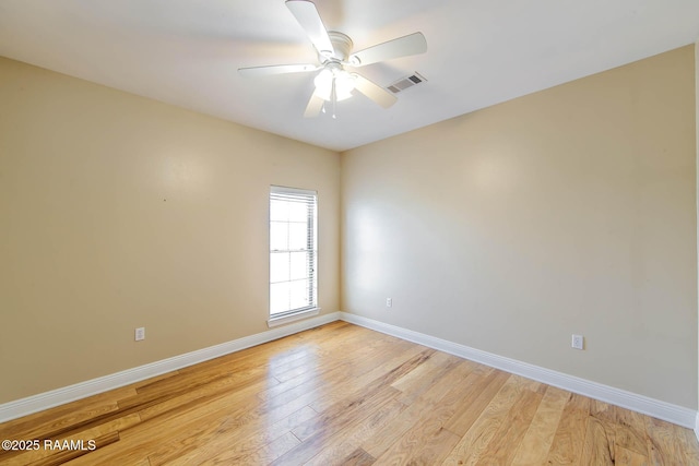 104 Trout Ct, Dulac, LA 70353 - empty room with baseboards, light wood finished floors, and a ceiling fan